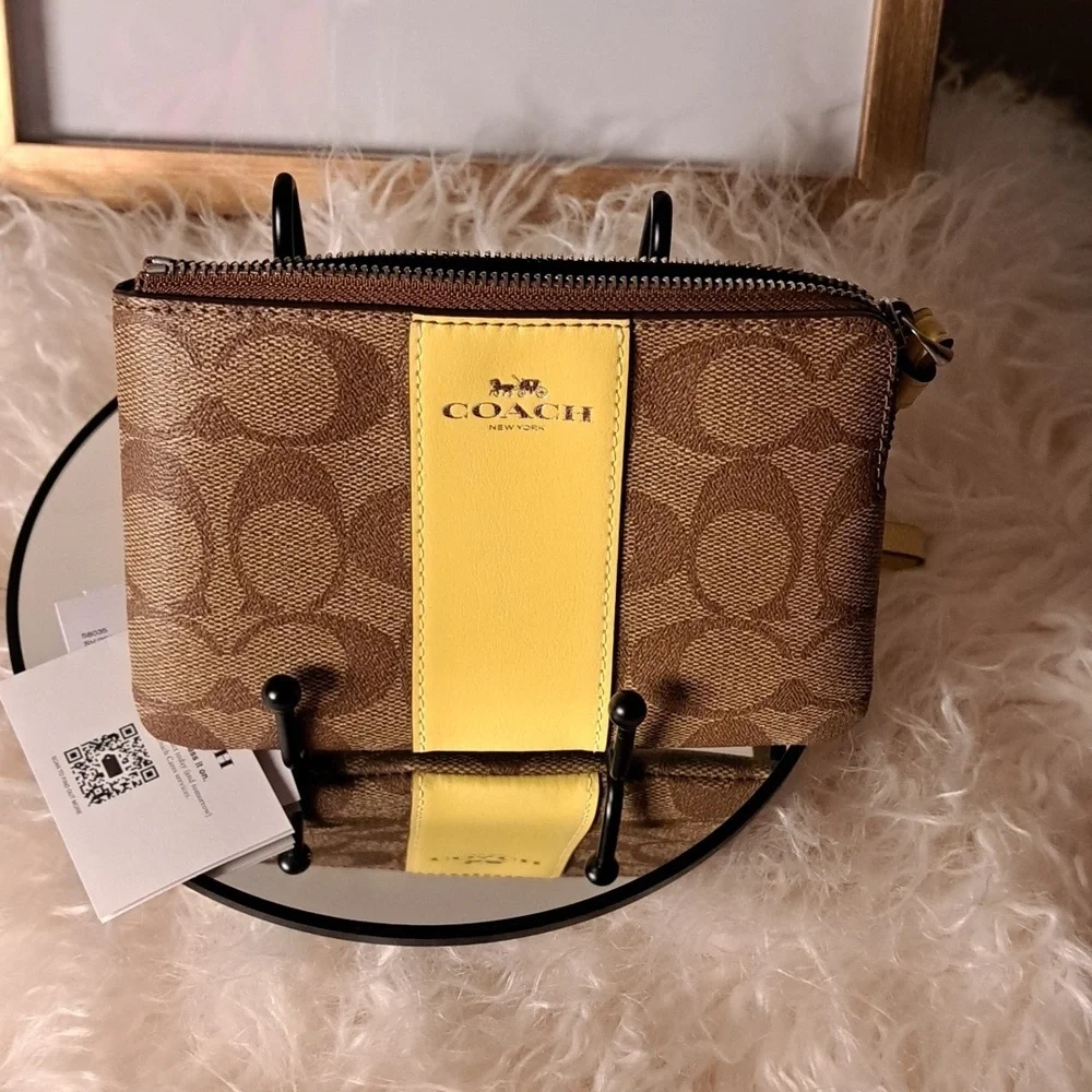 Coach NWTs Signature PVC Corner Zip Wristlet